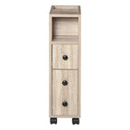 Meuble de salle de bain compact autoportant avec 2 placards ouverts, 1 placard avec porte, 1 tiroir et 4 roulettes