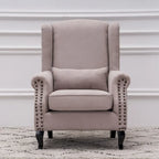 Fauteuil club à oreilles, garni, avec cloutage