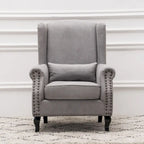 Fauteuil club à oreilles, garni, avec cloutage