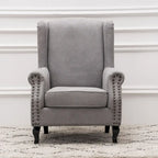 Fauteuil club à oreilles, garni, avec cloutage