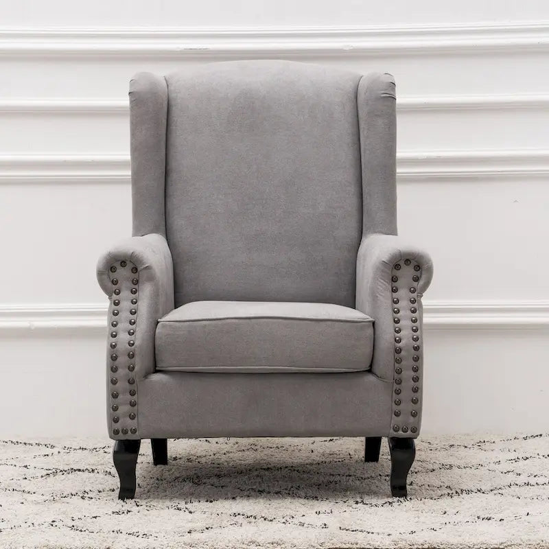 Fauteuil club à oreilles, garni, avec cloutage