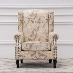 Fauteuil club à oreilles, garni, avec cloutage