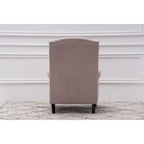 Fauteuil club à oreilles, garni, avec cloutage